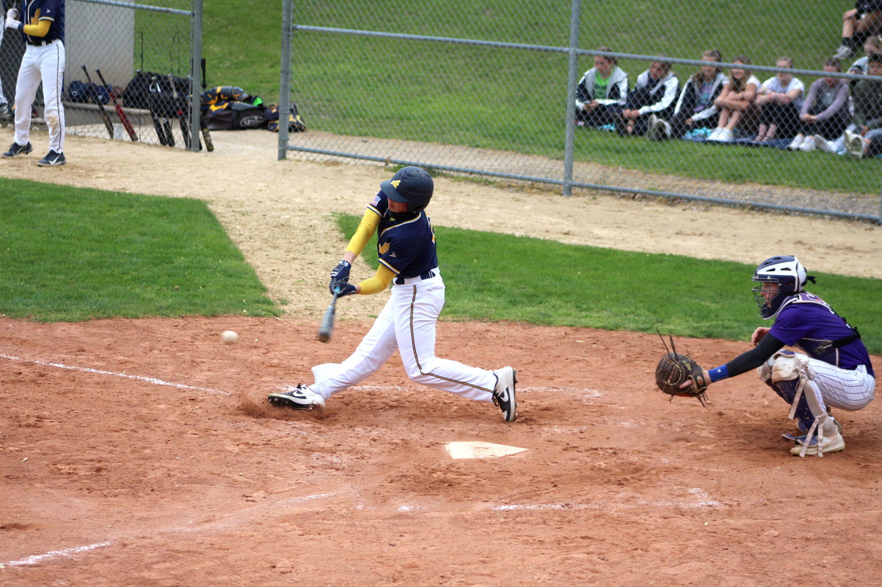 Michael Lium swings at a pitch